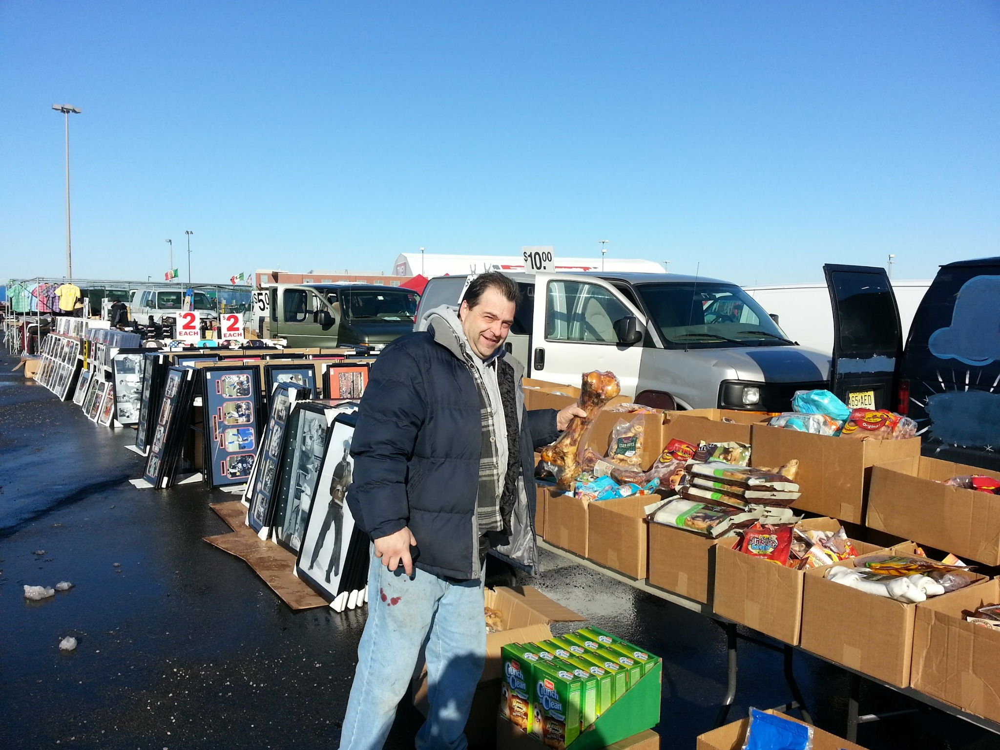 John Baldino working with closeout merchandise at a flea market